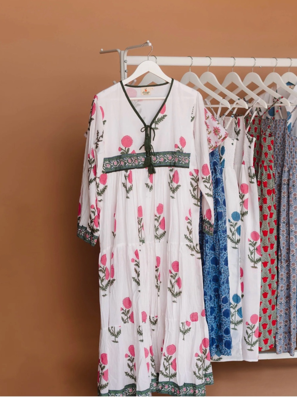 White Maxi Dress with Pink Floral Print and Green Trim
